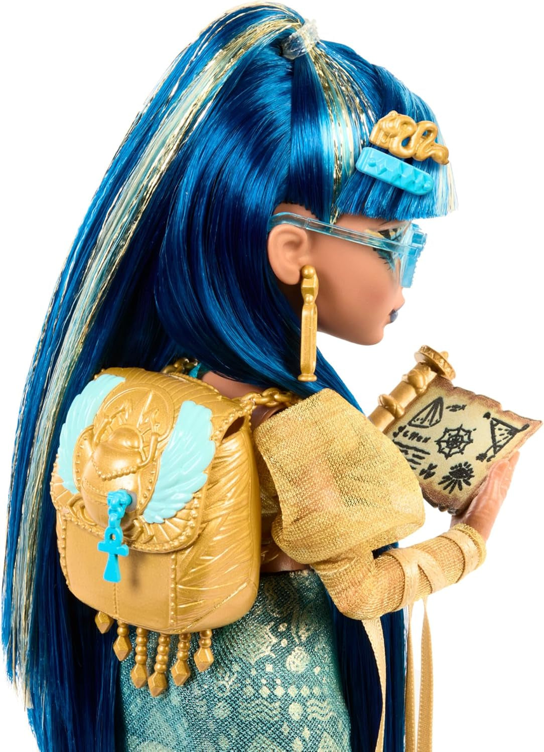 Lalka Monster High Cleo De Nile w złotej bluzce i warstwowej spódnicy, zawiera kobrę Hissette i akcesoria, takie jak tornister, przekąskę i rolkę papieru toaletowego, HXH74