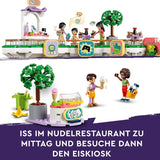 LEGO Store Friends Domek dla lalek Heartlake City Zestaw figurek dla dziewcząt i chłopców promuje rozwój społeczno-emocjonalny Prezent dla 8-latków 42604 Zestawy do budowania Besuche den LEGO-Store
