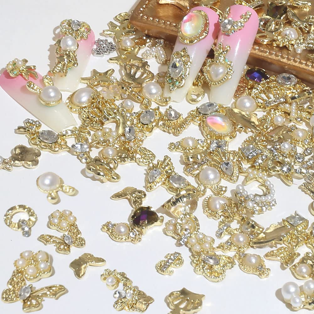 50 szt. złotych zawieszek do paznokci, mieszane style Glitzersteine ​​​​Nägel Perle Legierung Nagel Steine ​​Blume Schmetterling Strasssteine ​​Nägel Herz Stern Nagel Charms DIY Nail Art Zubehör Frauen Nägel Deko
