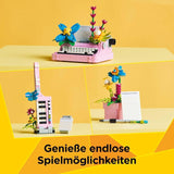 LEGO Creator Maszyna do pisania 3 w 1 z kwiatami - zabawkę można przekształcić w model Keytara lub w doniczkę z notatnikiem i długopisem - zestaw do budowania - prezent dla dziewcząt i chłopców od 8 lat 31169 Zestawy do budowania Besuche den LEGO-Store