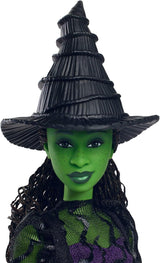 Mattel Wicked Elphaba Fashion Doll i akcesoria z zieloną skórą, czarnymi warkoczami, różnymi możliwymi pozami i odpinanym wyglądem sukni balowej, HXT62, [wielokolorowy]
