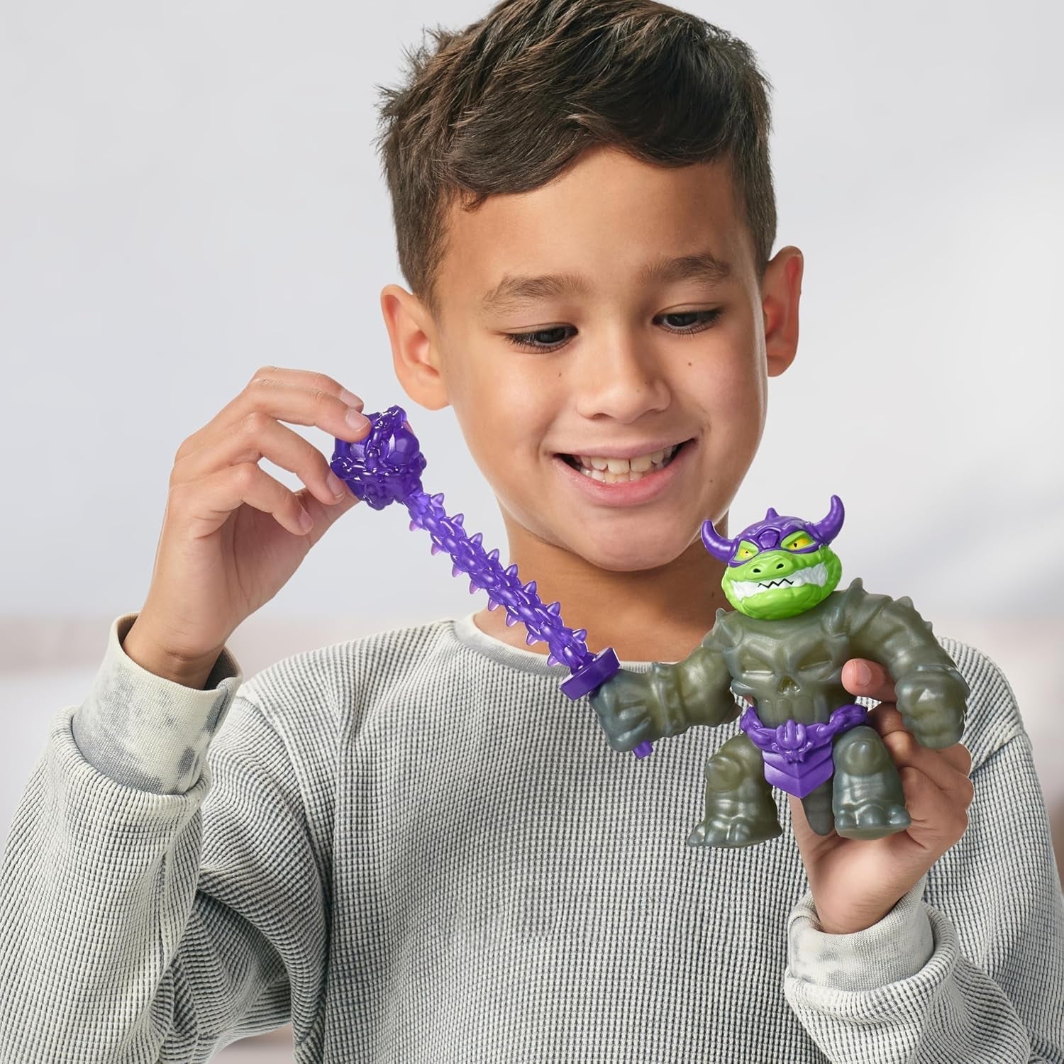 Heroes of Goo Jit Zu Stretch Strikers Deluxe Hero Pack Rock Jaw Rozciągliwa figurka z ponad 20 fajnymi figurkami wyposażenia bojowego Naty Shop