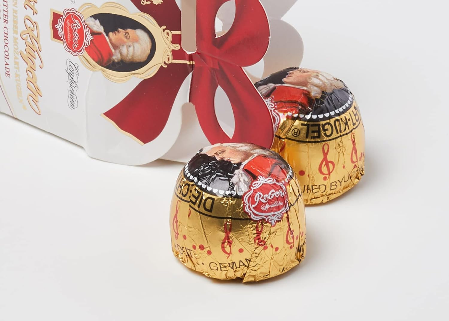 Rebel, Duet Mozart Kugeln, opakowanie 2 szt., kulki Mozarta z ciemnej czekolady nadziewane pistacjami i marcepanem, migdałami i nugatem z orzechów laskowych, 40g (2 kulki Mozarta)