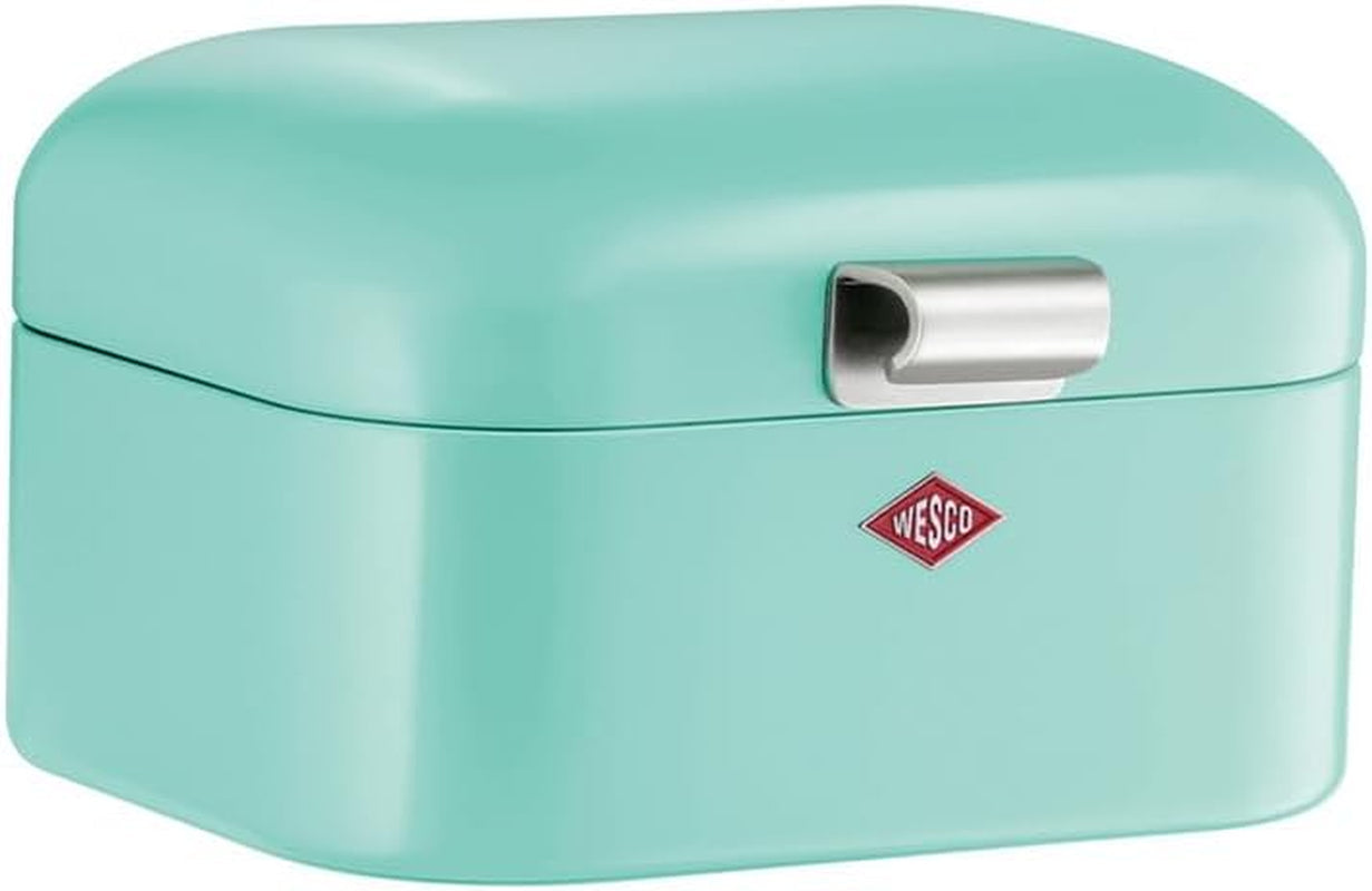 Pojemnik na chleb Wesco Mini Grandy w kolorze różowym, blacha stalowa malowana proszkowo, otwory wentylacyjne i solidne uchwyty Pudełka do przechowywania żywności Naty Shop Mint