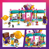 LEGO Friends Sklep w Heartlake Zestaw do zabawy dla dziewczynek od 6. roku życia Odgrywanie ról z 2 minilaleczkami, mikrolalką i zabawką dla kota 42649 Zestawy do budowania Besuche den LEGO-Store