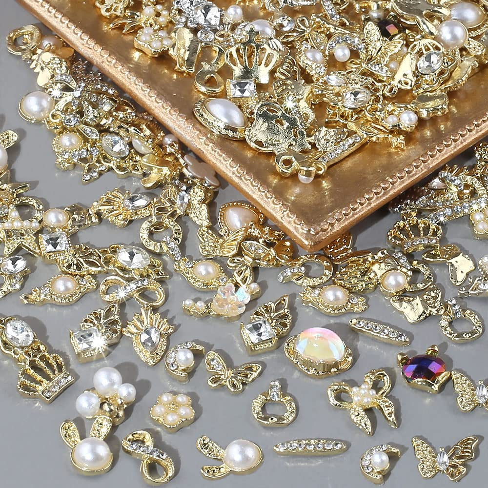 50 szt. złotych zawieszek do paznokci, mieszane style Glitzersteine ​​​​Nägel Perle Legierung Nagel Steine ​​Blume Schmetterling Strasssteine ​​Nägel Herz Stern Nagel Charms DIY Nail Art Zubehör Frauen Nägel Deko