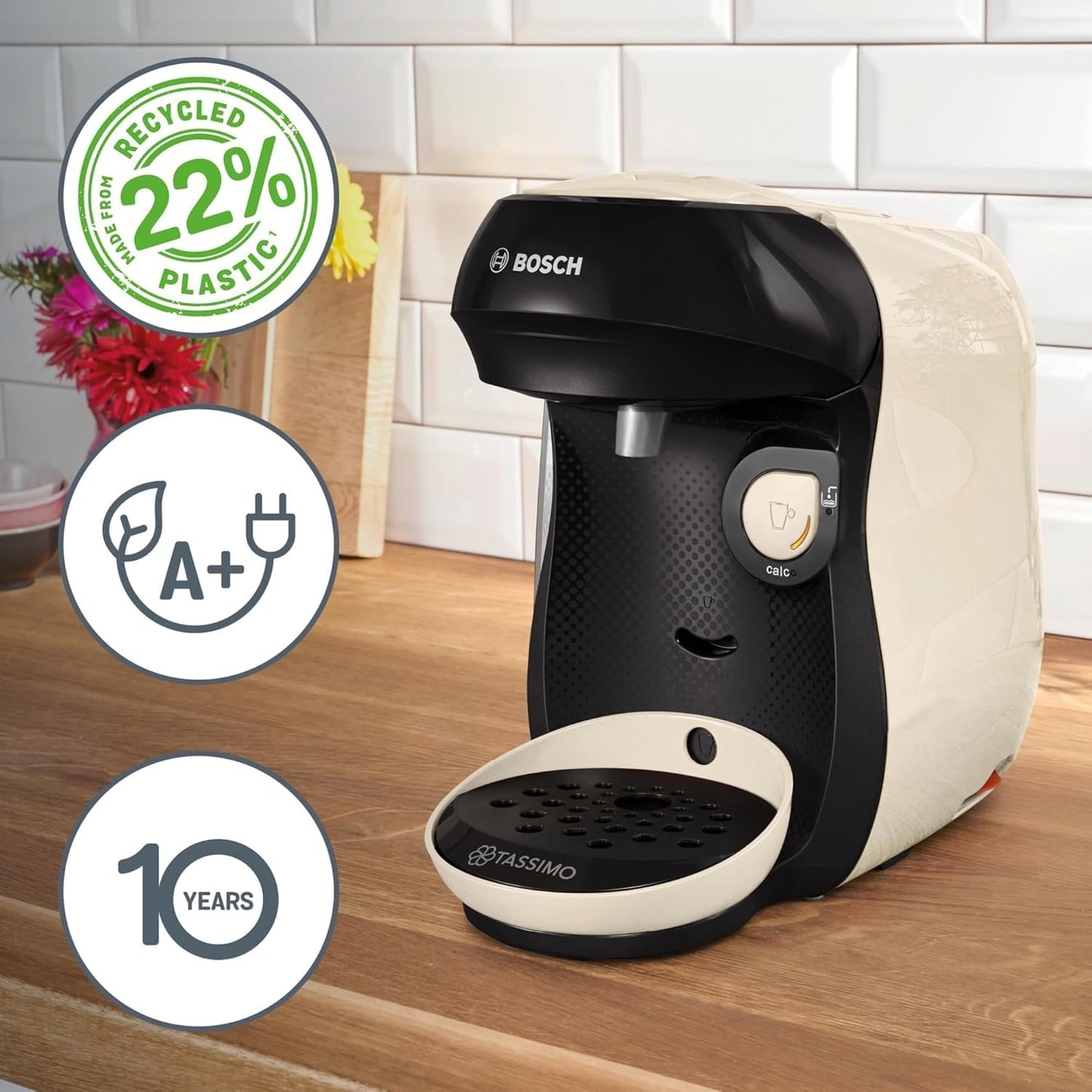 Bosch Tassimo Happy Friendly TAS107E Ekspres na kapsułki do espresso, ponad 70 napojów, odpowiedni do wszystkich filiżanek, Auto-Stop, zrównoważony rozwój, idealne dozowanie, oszczędność miejsca, 1400 W, kremowy/czarny