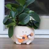 Doniczki z uśmiechniętą buźką Śliczne żywiczne głowy Naszyjnik z pereł Doniczka Unikalna gitara Wewnątrz Na zewnątrz Soczyste doniczki Pomysł na prezent dla mamy