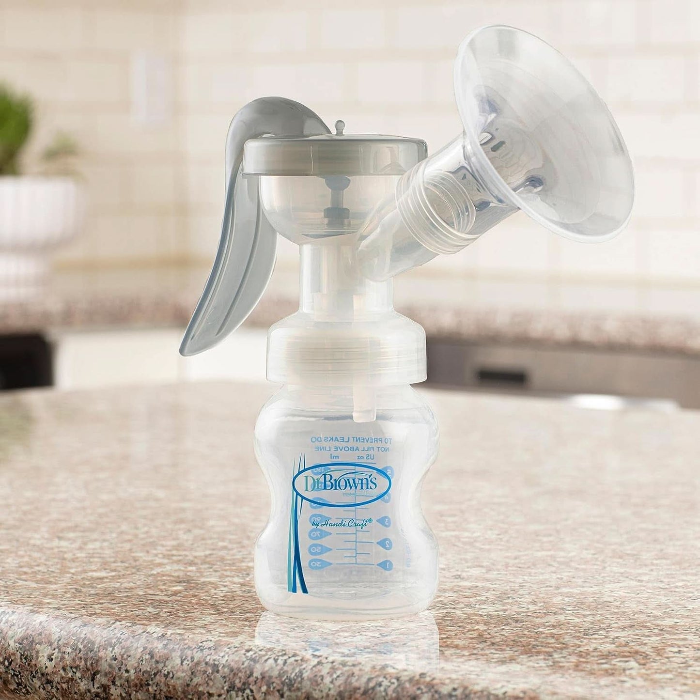 Laktator ręczny ze 100% silikonem Ochrona Softshape (B, kołnierz 25 mm) i opcjami antykolkowymi + Butelka 150 ml z szeroką szyjką i smoczkiem o wolnym przepływie poziomu 1 Akcesoria Żywność i karmienie piersią Sklep Bebe Naty