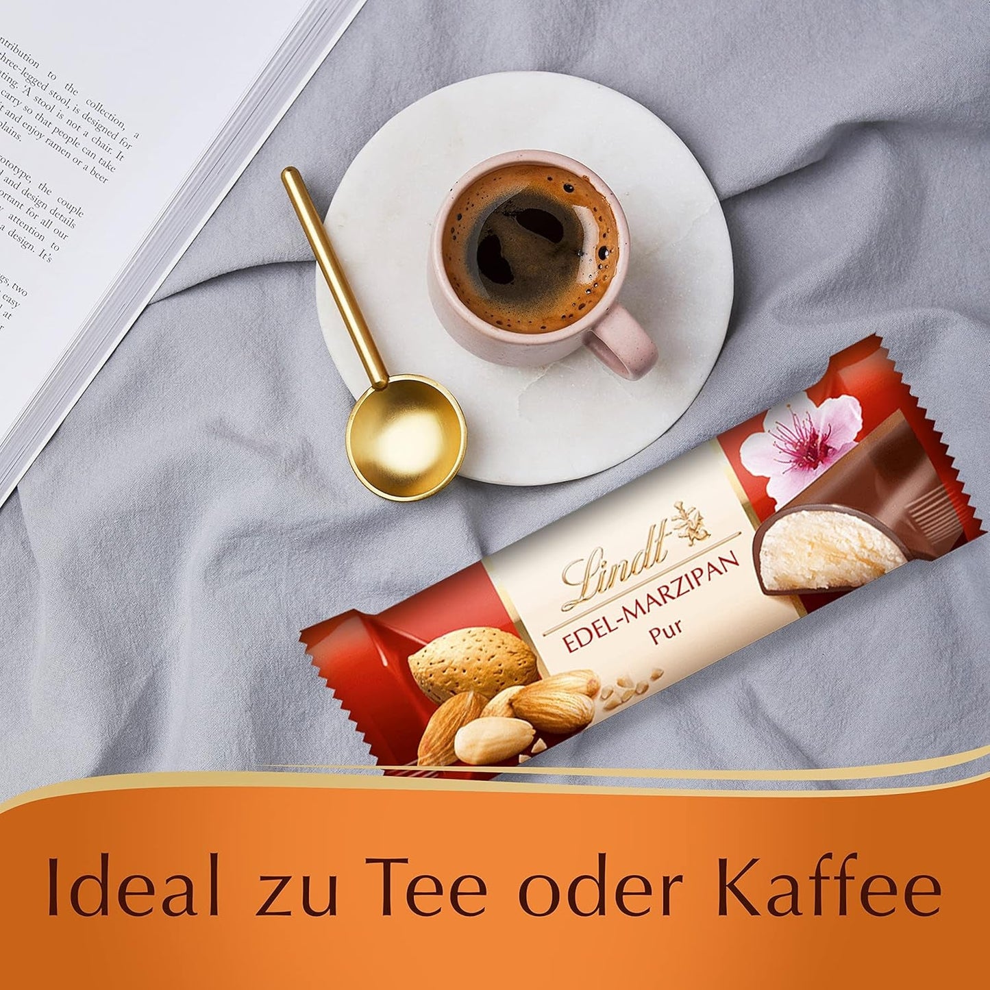 Prezentacja topu czekoladowego Lindor | 1718 g i tabliczki czekolady z marcepanem | 25 batonów x 50g w displayu naladowym | 1250 g | Czysty marcepan oblany ciemną czekoladą | Batony czekoladowe