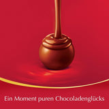 Prezentacja topu czekoladowego Lindor | 1718 g i tabliczki czekolady z marcepanem | 25 batonów x 50g w displayu naladowym | 1250 g | Czysty marcepan oblany ciemną czekoladą | Batony czekoladowe