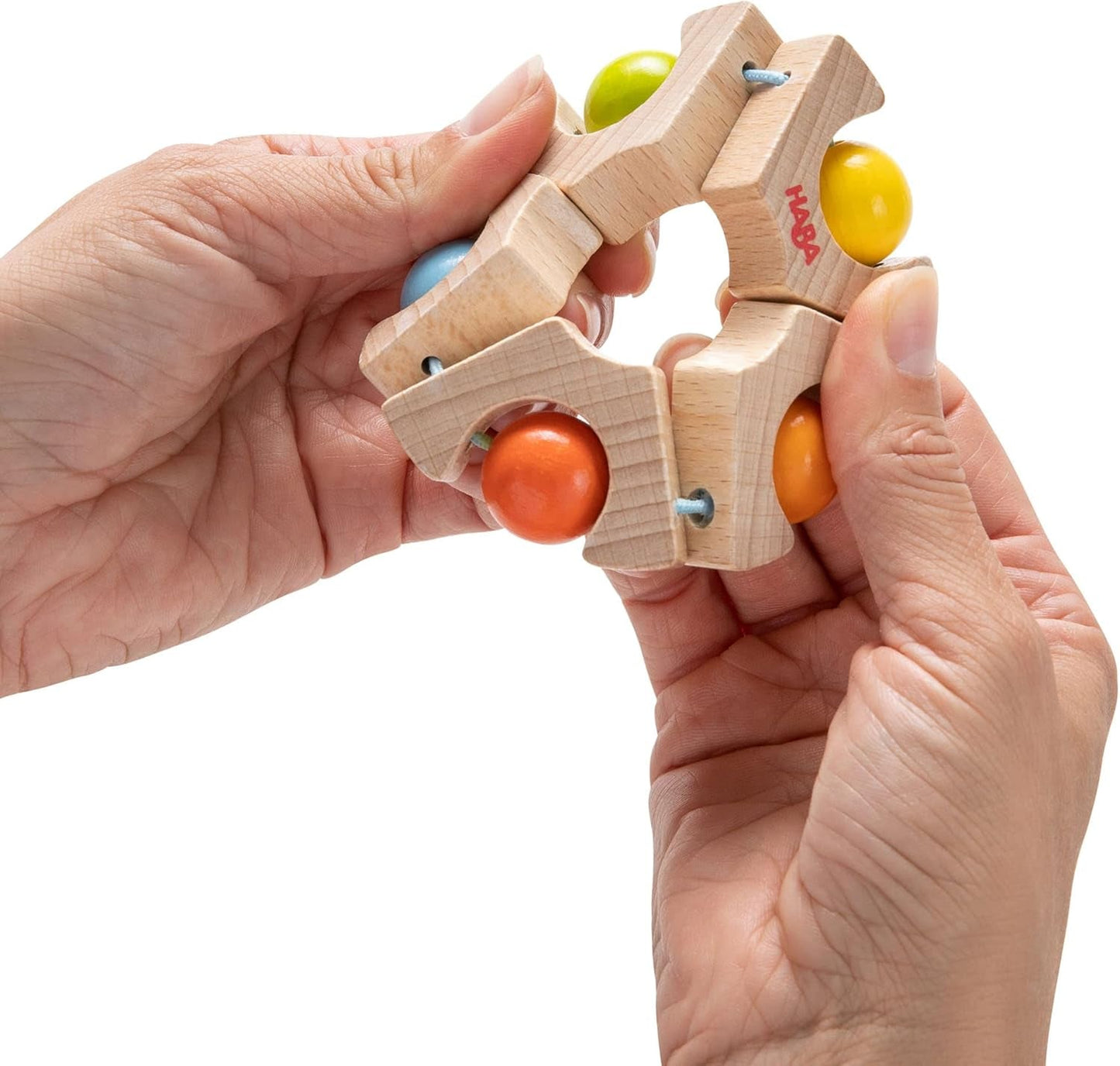 HABA 306692 - Zabawka do łapania z kółkiem kulkowym, Zabawka do łapania od 6 miesiąca życia, Wyprodukowano w Niemczech, Kolorowe zabawki Bebe Naty Shop
