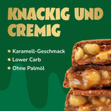 Przed nami batoniki czekoladowe z karmelem i orzechami laskowymi | 12 tabliczek czekolady x 35 g bez dodatku cukru | 1,9 g cukru na batonik | Chrupiący smak orzecha laskowego i karmelu | Słodycze o niskiej zawartości węglowodanów | Żadnego oleju palmowego