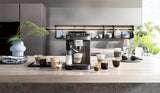 De'Longhi Magnifica Evo Next - W pełni automatyczny ekspres Perfetto ze spieniaczem do mleka LatteCrema, 13 napojów za jednym dotknięciem, ekspres do kawy i cappuccino, kolorowy ekran dotykowy, tytan (ECAM312.80.TB)