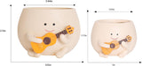 Doniczki z uśmiechniętą buźką Śliczne żywiczne głowy Naszyjnik z pereł Doniczka Unikalna gitara Wewnątrz Na zewnątrz Soczyste doniczki Pomysł na prezent dla mamy