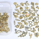 50 szt. złotych zawieszek do paznokci, mieszane style Glitzersteine ​​​​Nägel Perle Legierung Nagel Steine ​​Blume Schmetterling Strasssteine ​​Nägel Herz Stern Nagel Charms DIY Nail Art Zubehör Frauen Nägel Deko