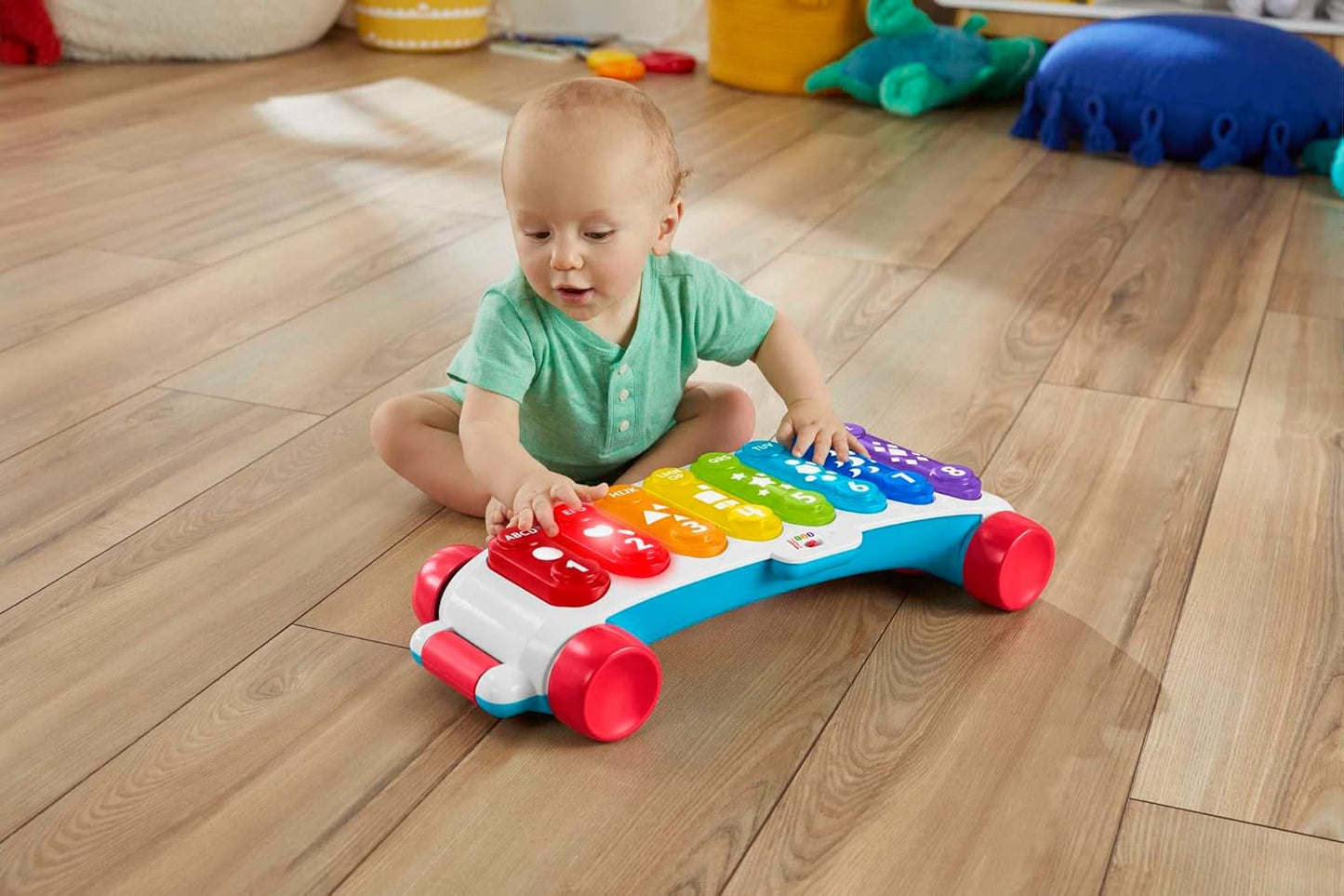 Fisher-Price Świecący ksylofon gigant - elektroniczny instrument muzyczny do ciągnięcia wraz z piosenkami z treściami edukacyjnymi, dla dzieci, już od 9 miesiąca życia, wielokolorowy, wersja: francuska, HJK40 Jucarii Bebe Naty Shop