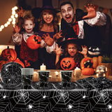 49-częściowy zestaw sztućców papierowych w kształcie pająka na Halloween, w tym talerze, serwetki, szklanki i obrus. Czarny zestaw obiadowy składający się z talerzy deserowych, serwetek i szklanek.
