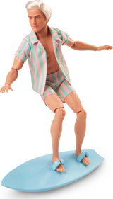 Barbie Movie Ken Barbie lalka Barbie w kostiumie plażowym w pastelowe różowe i zielone paski, desce surfingowej i białych tenisówkach, JBJ54