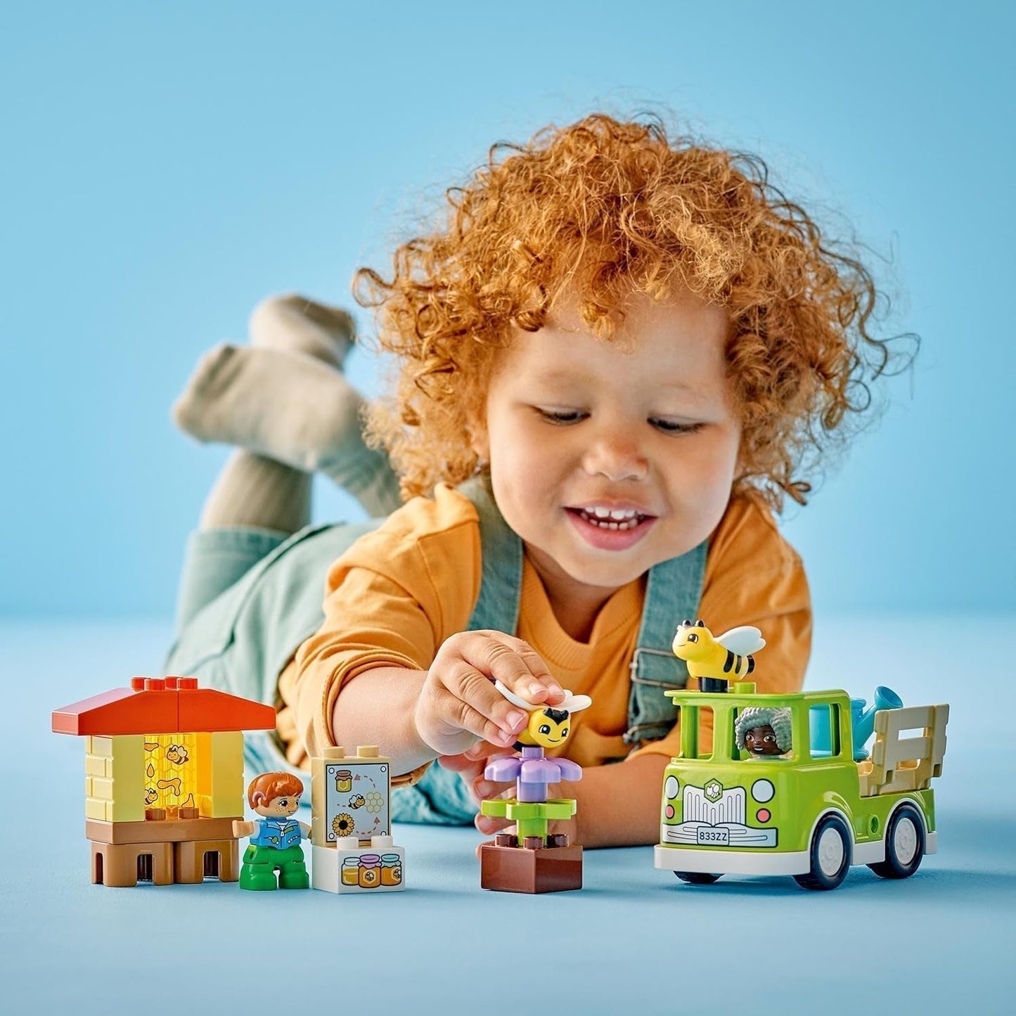 LEGO DUPLO Miejskie pszczelarstwo i ule, zabawka edukacyjna dla małych dzieci z 2 figurkami i ruchomą ciężarówką, zestaw do budowania i przebudowy, zabawka dla małych dzieci od 2 lat 10419 Zestawy do budowania Besuche den LEGO-Store