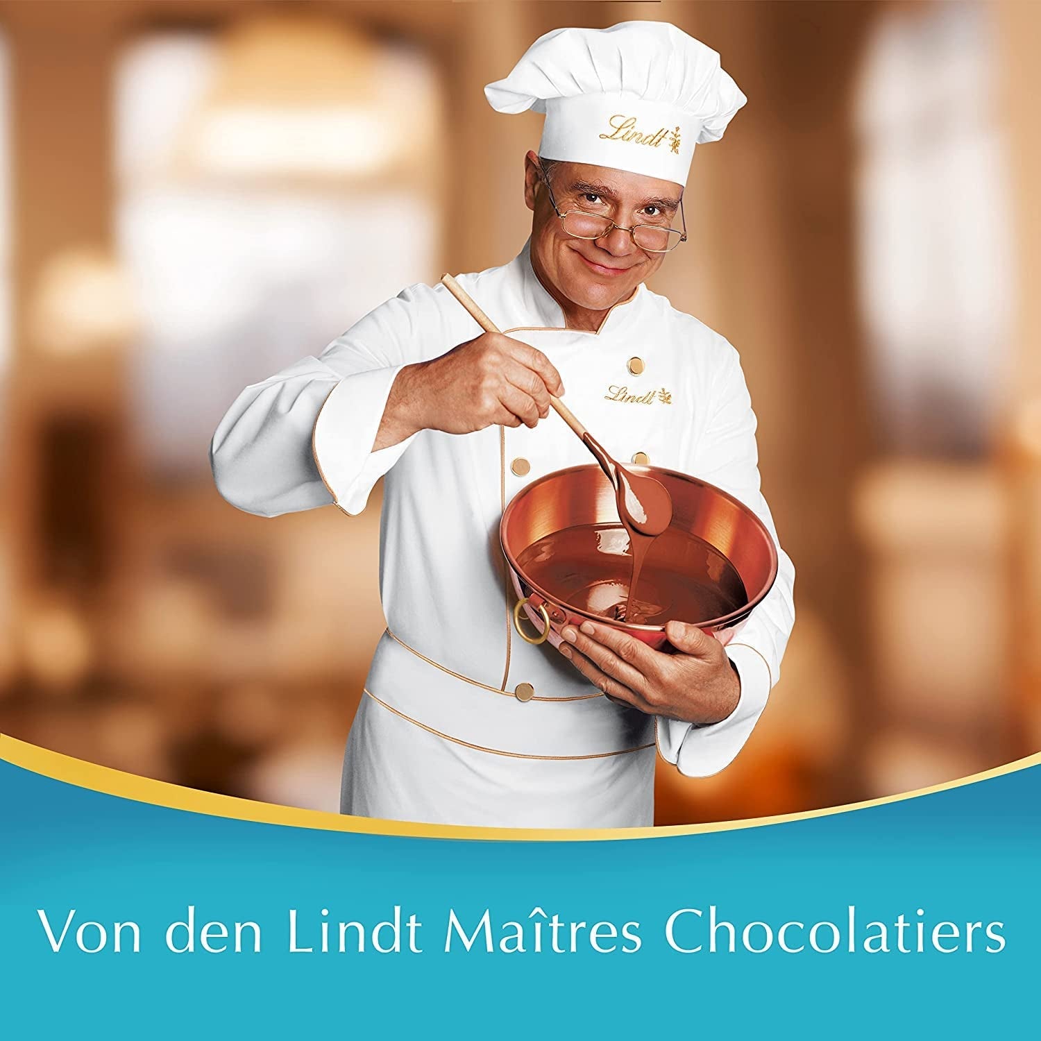 LINDOR kulki czekoladowe z solonym karmelem | ok. 80 kulek z mlecznej czekolady z nadzieniem solonym karmelem | Opakowanie zbiorcze i kulki czekoladowe Marc de Champagne | 700 gr