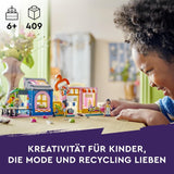 LEGO Friends Zestaw do budowania sklepu z modą vintage dla dzieci ze sklepem z zabawkami, figurkami i kotem, model do odgrywania ról zapewniający rozwój społeczno-emocjonalny, prezent dla 6-letnich dziewcząt i chłopców 42614 Zestawy do budowania Besuche den LEGO-Store
