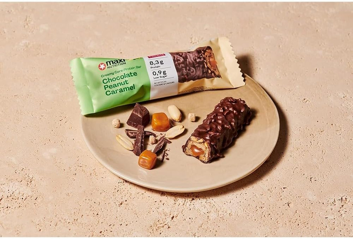 MaxiNutrition Kremowy wegański baton proteinowy z czekoladą, orzeszkami ziemnymi i karmelem 12x45g - wegański baton proteinowy, 18% białka, 8,3g w batonie, niska zawartość cukru (0,9g), bez dodatku cukru, bez sztucznych aromatów