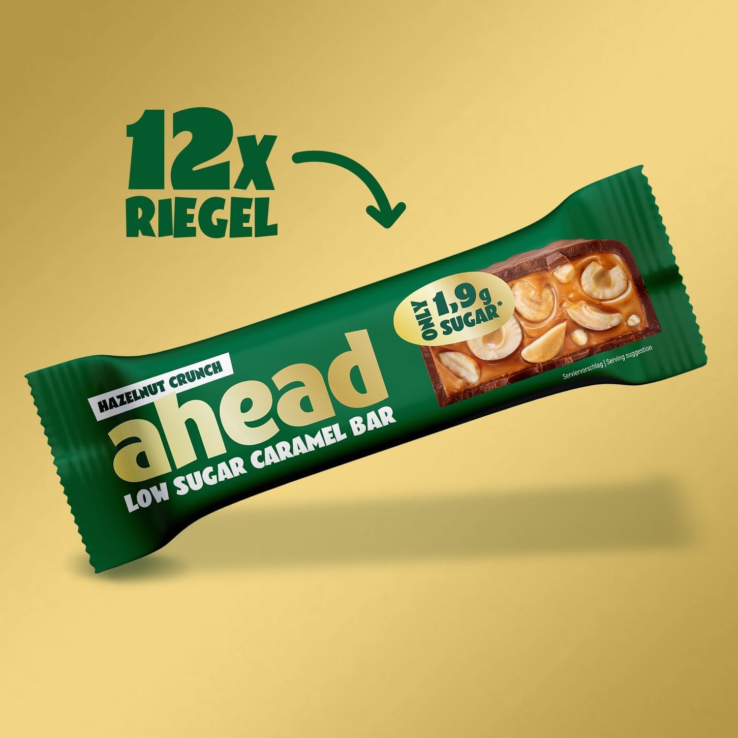 Przed nami batoniki czekoladowe z karmelem i orzechami laskowymi | 12 tabliczek czekolady x 35 g bez dodatku cukru | 1,9 g cukru na batonik | Chrupiący smak orzecha laskowego i karmelu | Słodycze o niskiej zawartości węglowodanów | Żadnego oleju palmowego