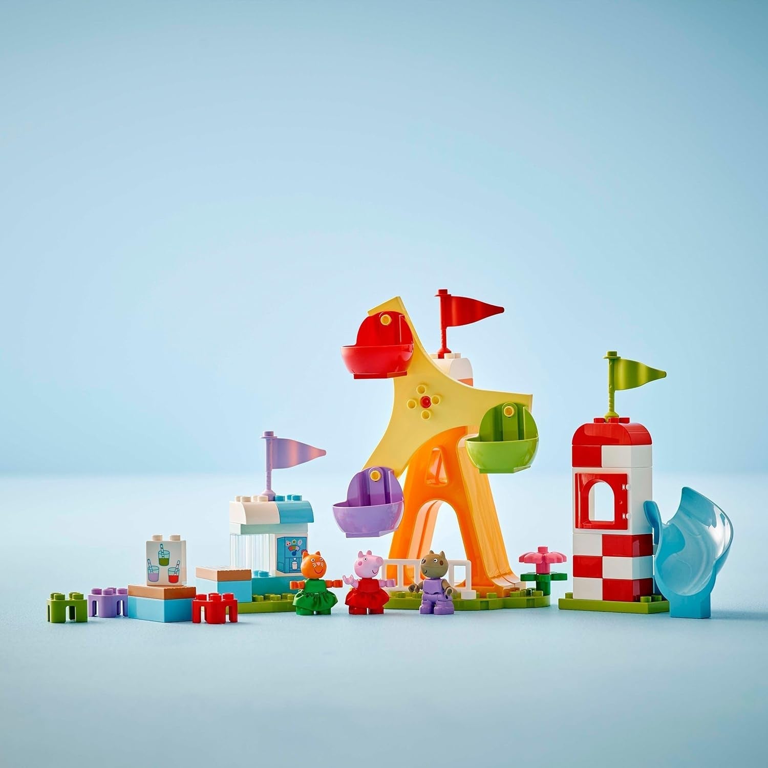 LEGO DUPLO Jarmark Peppa Wutza — Zabawki dla dzieci i zabawki motoryczne od 2. roku życia — Gry dla przedszkolaków z dużym kołem, zjeżdżalnią i 3 figurkami, w tym Mollie Kitty i Klausi Kläff — Prezent dla dzieci 10453 Zestawy do budowania Besuche den LEGO-Store