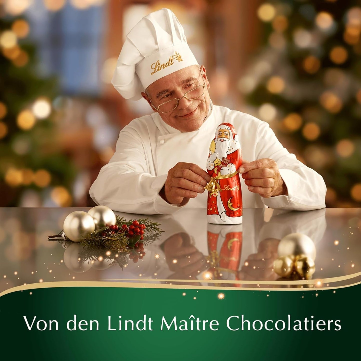 Lindt Świąteczny batonik czekoladowy z migdałami | 100 g | Migdały w kremie orzechowym oblane najlepszą mleczną czekoladą | Świąteczny prezent czekoladowy