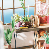Robotime DG145 Rolife Emily's Flower Shop Miniaturowy domek dla lalek Wykonany z drewna, metalu, tkaniny i kartonu, Wymiary: 22 X 15 X 17 Cm, Domy dla lalek Naty Shop