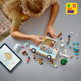 LEGO Friends Przyczepa kempingowa, zestaw do budowania do odgrywania ról z przyczepą kempingową, prezent dla dziewczynek w wieku od 7 lat, kreatywny zestaw z 3 minifigurkami i figurką zwierzątka fretki 42663 Zestawy do budowania Besuche den LEGO-Store