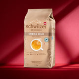 Schwiizer Schüümli Crema Mild, 100% ziaren kawy premium Arabica, owocowe i orzechowe, do w pełni automatycznych ekspresów do kawy, moc 2/5, jasno palona, ​​certyfikat Rainforest Alliance, 1 kg (opakowanie 2 szt.)