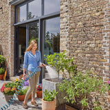 Gardena 4647-20 kompletny zestaw węża spiralnego, z automatycznym zwijaniem węża, z dyszą natryskową i przyłączem do kranu (długość węża: 10 m, średnica węża: 9 mm, zestaw: tak)