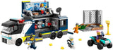 LEGO City Ciężarówka policyjna z laboratorium, quad policyjny i zabawkowa ciężarówka dla dzieci, prezent dla chłopców i dziewcząt od 7 lat oraz 5 minifigurek — 2 policjantów, 1 naukowiec i 2 oszustów 60418 Zestawy do budowania Szukaj w sklepie LEGO