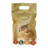 Mieszanka czekoladowa LINDOR | 1371 g | Około. 109 kulek: Klasyczna mieszanka kulek z mlecznej czekolady i LINDOR | Około. 80 kulek czekoladowych (mleczna, biała, ciemna 60%, orzech laskowy) | Opakowanie zbiorcze, 1 kg