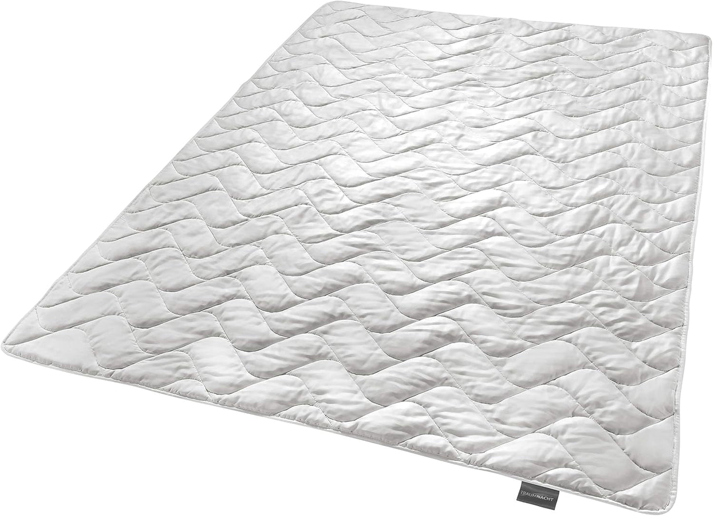 Traumnacht Exklusiv Lekka kołdra letnia wykonana w 100% z dzikiego jedwabiu, z certyfikatem Oeko-Tex, wyprodukowana w Niemczech, gramatura wypełnienia: 550 gr, 135 x 200 cm Kołdry i kołdry Naty Shop 135 x 200 Koc letni - Dziki jedwab