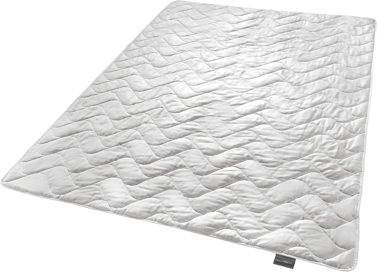 Traumnacht Exklusiv Lekka kołdra letnia wykonana w 100% z dzikiego jedwabiu, z certyfikatem Oeko-Tex, wyprodukowana w Niemczech, gramatura wypełnienia: 550 gr, 135 x 200 cm Kołdry i kołdry Naty Shop 135 x 200 Koc letni - Dziki jedwab
