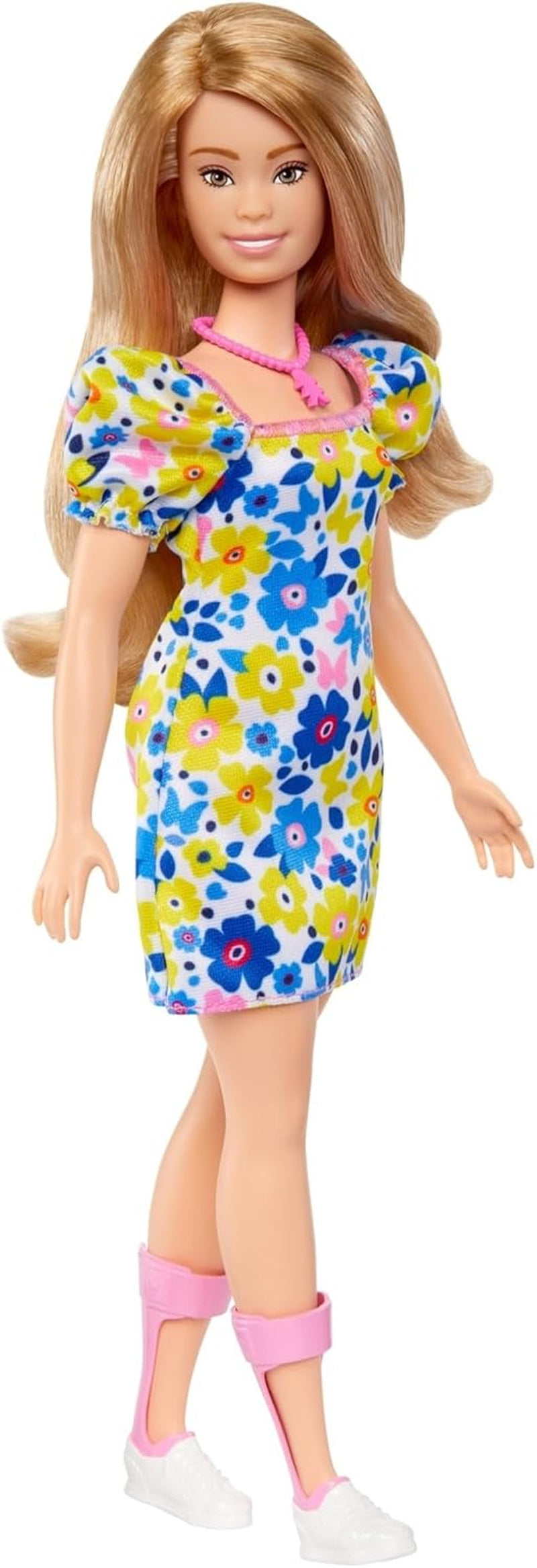 Lalka Barbie Fashionistas, opracowana we współpracy z Narodowym Towarzystwem Zespołu Downa, z blond włosami i nowoczesnym strojem: kwiecistą sukienką i białymi tenisówkami, dla dzieci w wieku od 3 lat, HJT05