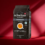 Schwiizer Schüümli Espresso, kawa ziarnista 100% Arabica, mocna i intensywna, idealna do automatycznych ekspresów ciśnieniowych, moc 4/5, średnio palona, ​​Rainforest Alliance, 1kg