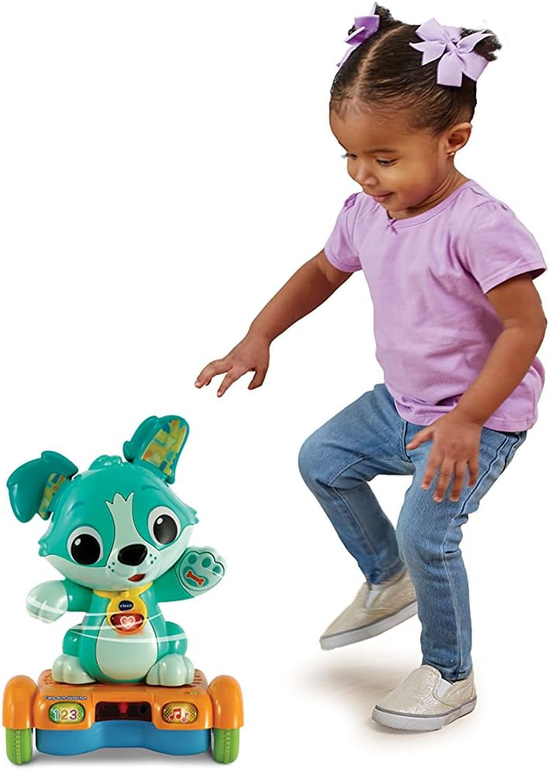 Vtech Baby Catch Me Puppy - Zmotoryzowany szczeniak na deskorolce zachęca do ruchu - Z ruchomymi uszami, piosenkami, dźwiękami i treściami edukacyjnymi - Dla dzieci w wieku 12-36 miesięcy Bebe Toys Naty Shop