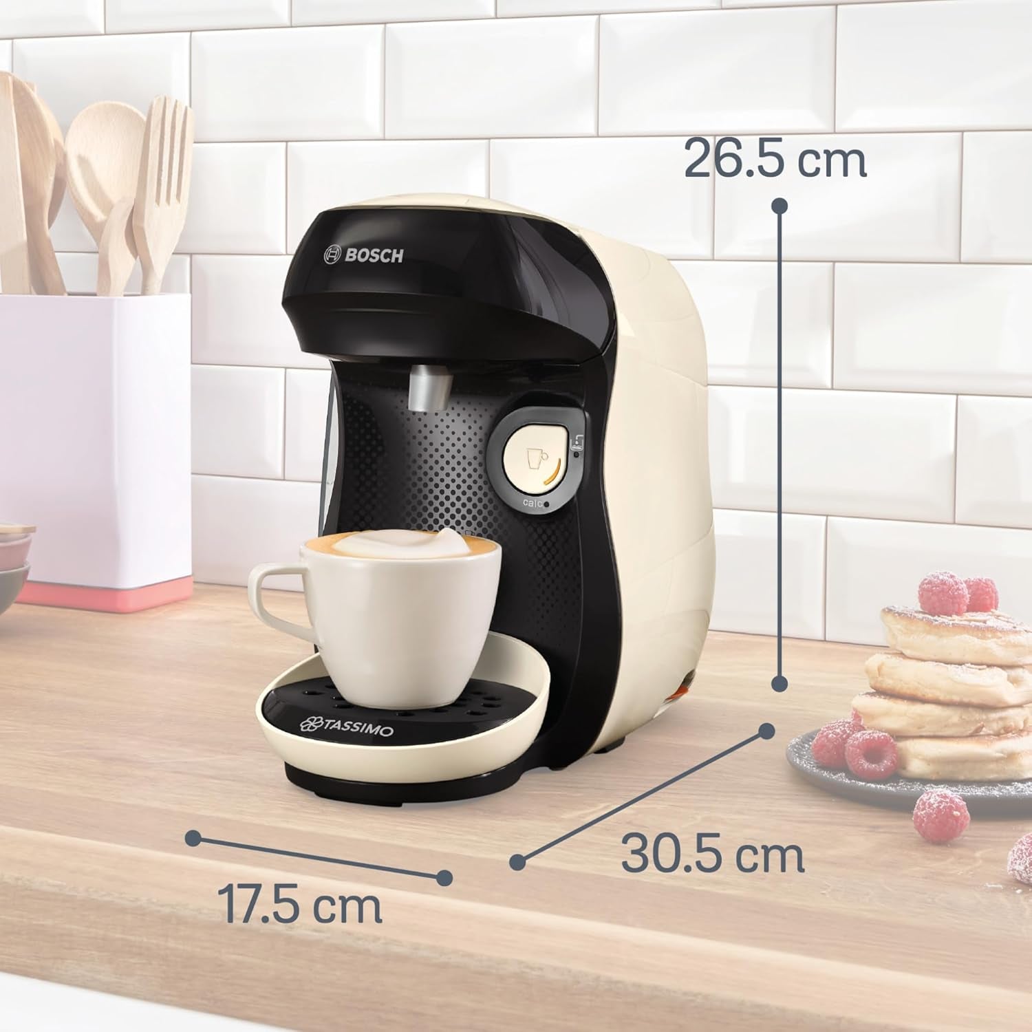 Bosch Tassimo Happy Friendly TAS107E Ekspres na kapsułki do espresso, ponad 70 napojów, odpowiedni do wszystkich filiżanek, Auto-Stop, zrównoważony rozwój, idealne dozowanie, oszczędność miejsca, 1400 W, kremowy/czarny