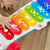 Fisher-Price Świecący ksylofon gigant - elektroniczny instrument muzyczny do ciągnięcia wraz z piosenkami z treściami edukacyjnymi, dla dzieci, już od 9 miesiąca życia, wielokolorowy, wersja: francuska, HJK40 Jucarii Bebe Naty Shop