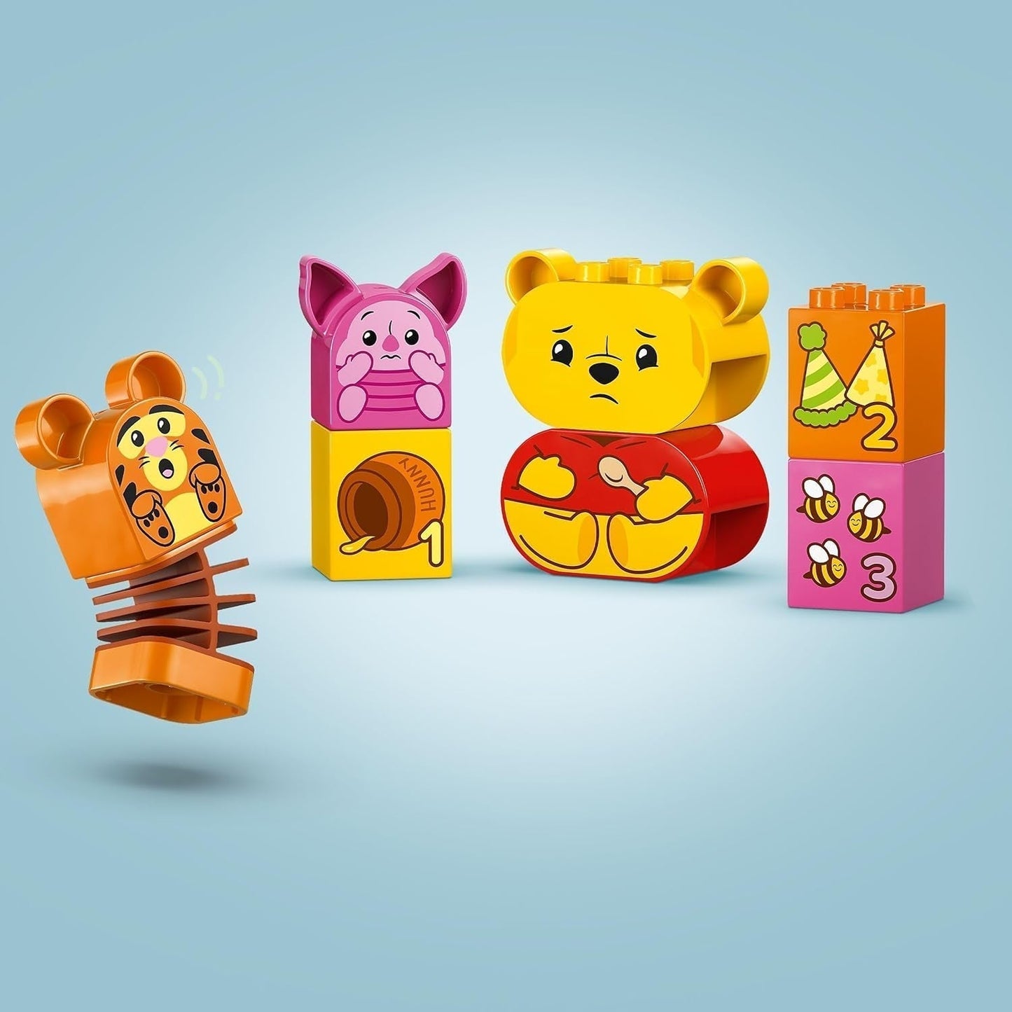 LEGO DUPLO - Disney Przyjęcie urodzinowe Kubusia Puchatka - zabawka edukacyjna dla przedszkolaków - zestaw 3 minifigurek, w tym Kubuś Puchatek, Tygrysek i Prosiaczek - pomysł na prezent dla chłopców i dziewcząt od 1,5 roku 10457 Zestawy konstrukcyjne Beuche w sklepie LEGO