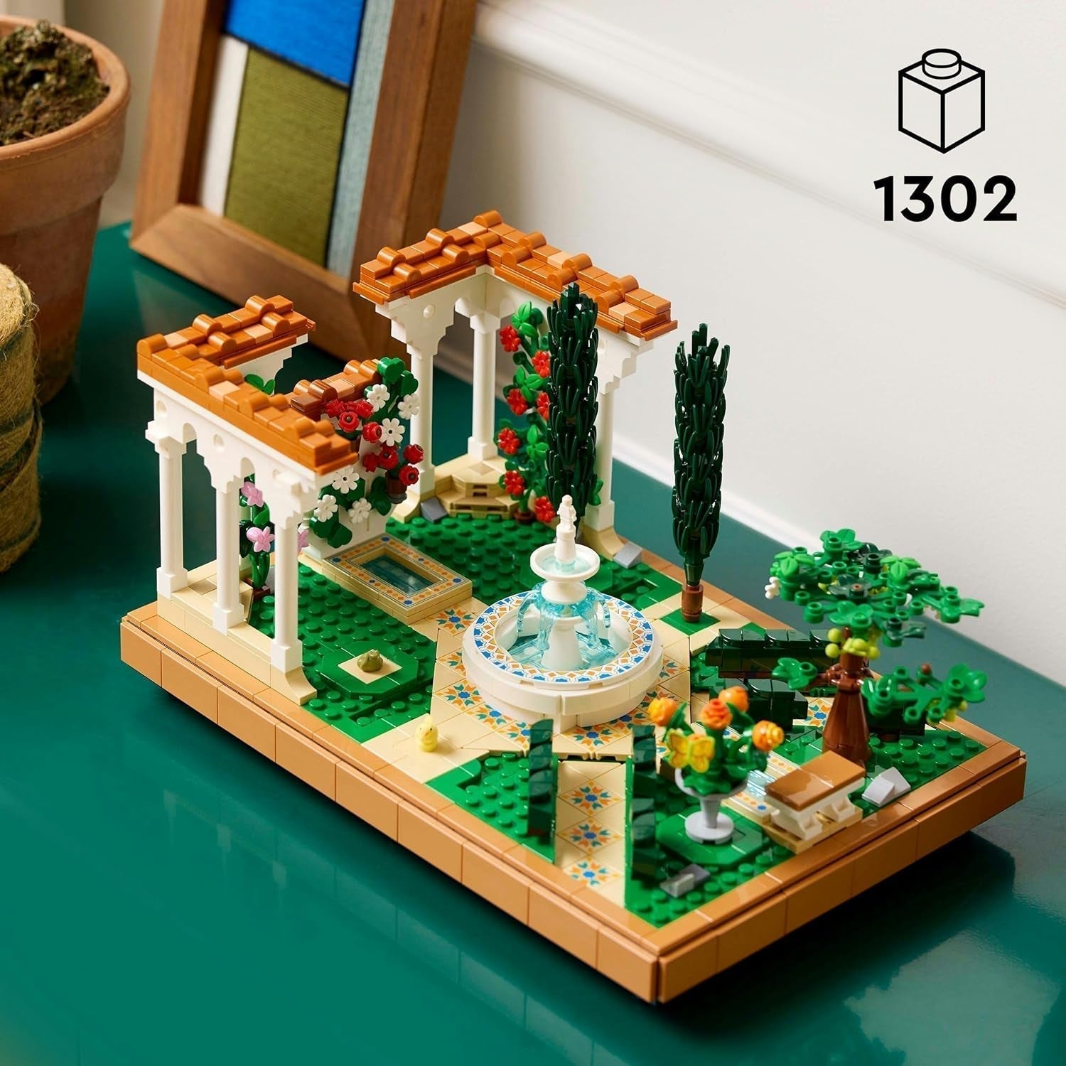 LEGO Icons Ogród fontann - Miniaturowy zestaw do budowania dla dorosłych z liśćmi, cyprysami, drzewami, winoroślą i kwiatami - Pomysł na kreatywny prezent urodzinowy, prezent na parapetówkę dla kobiet i mężczyzn - 10359 Zestawy do budowania Beuche den LEGO-Store