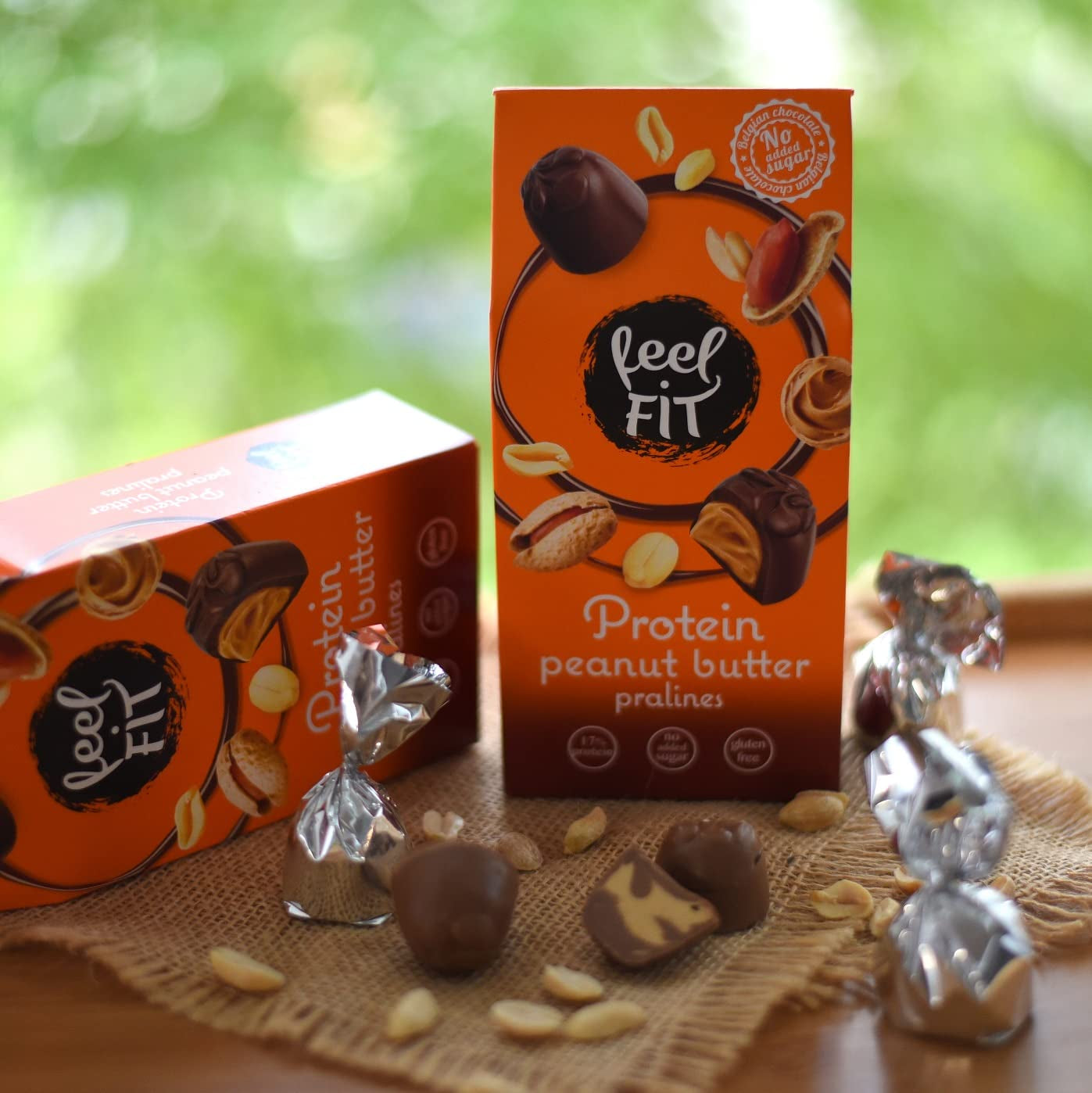 Feel FIT Praliny proteinowe z masłem orzechowym w wysokiej jakości mlecznej czekoladzie, bez dodatku cukru, 17% białka, bezglutenowe 66g (1 opakowanie)