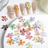 100 szt. 3D Blume Nagel Charms Nägel Zubehör Nageldesign Glitzersteine ​​​​Nailart Strasssteine ​​​​Kwiatowe zawieszki do paznokci Luminous Flower Nail Art Charms Bunte Blumen Deko Nagel Steinchen Kwiaty do paznokci