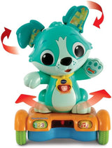 Vtech Baby Catch Me Puppy - Zmotoryzowany szczeniak na deskorolce zachęca do ruchu - Z ruchomymi uszami, piosenkami, dźwiękami i treściami edukacyjnymi - Dla dzieci w wieku 12-36 miesięcy Bebe Toys Naty Shop