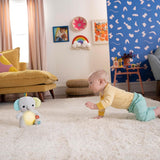 Bright Starts, słoniątko do przytulania ze światełkami, piosenkami, różnymi teksturami i nie tylko, wielokolorowe zabawki Bebe Naty Shop