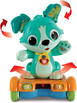 Vtech Baby Catch Me Puppy - Zmotoryzowany szczeniak na deskorolce zachęca do ruchu - Z ruchomymi uszami, piosenkami, dźwiękami i treściami edukacyjnymi - Dla dzieci w wieku 12-36 miesięcy Bebe Toys Naty Shop